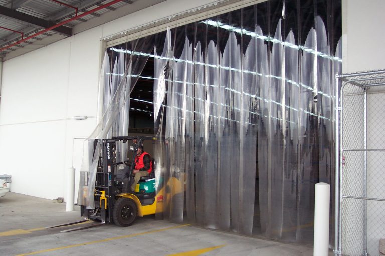 What are the benefits of installing PVC strip curtains and doors?